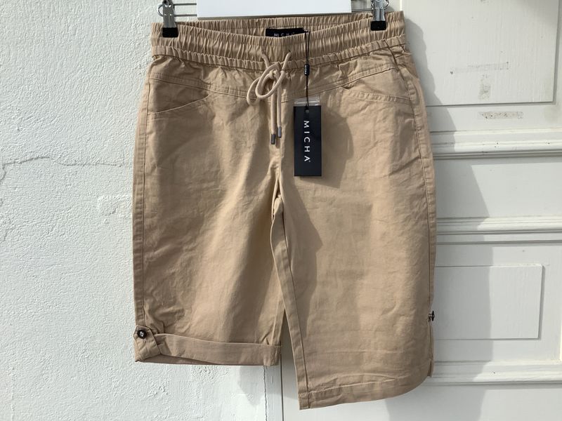 City shorts, sand